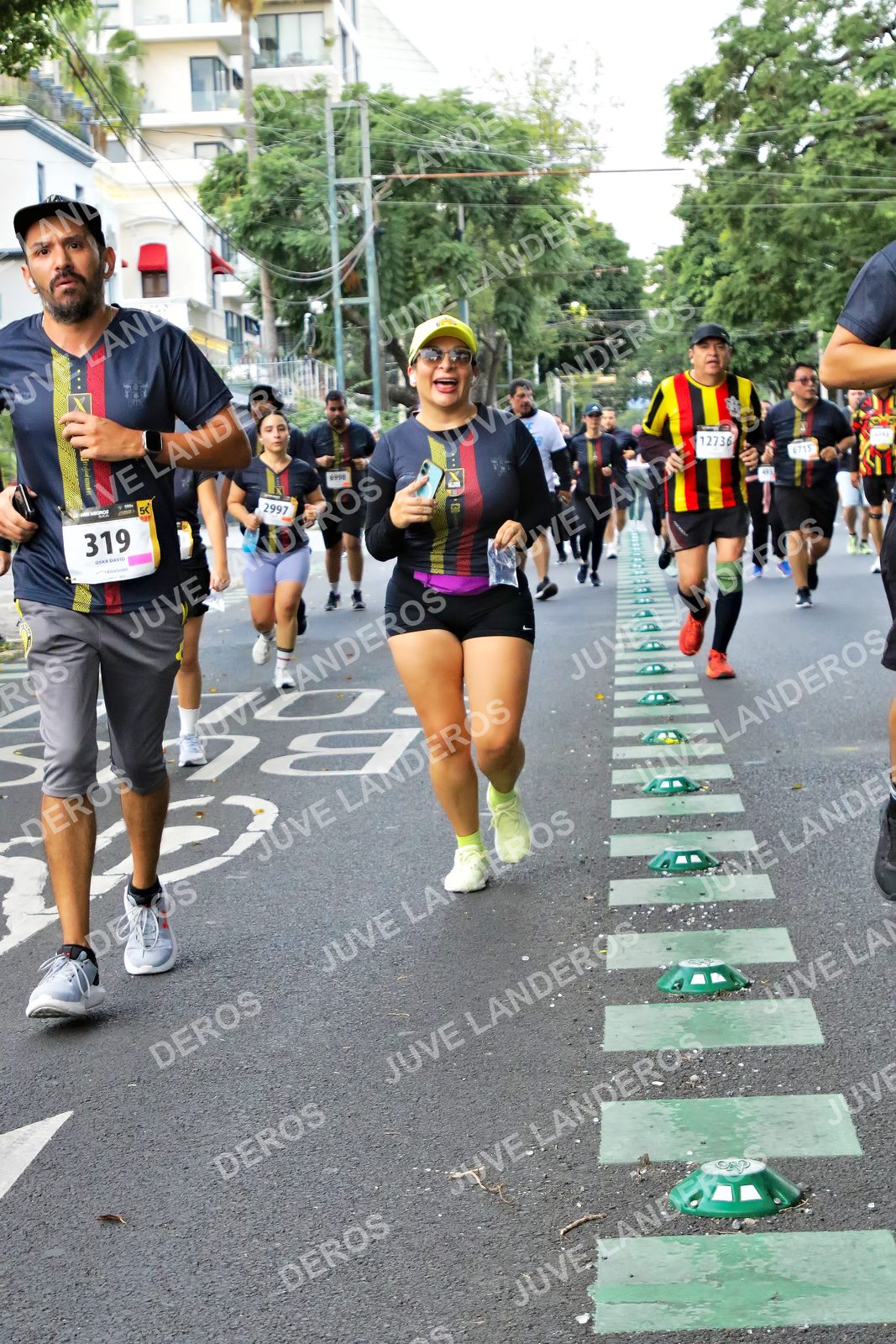 Foto de la X Carrera Leones Negros Red Cola 2026 en Rectoría General de la UdeG, Av. Juárez 976 (meta en Av. Enrique Díaz de León y Pedro Moreno), Guadalajara a las 07:14 · dorsal 319, 12736, 2997, 78