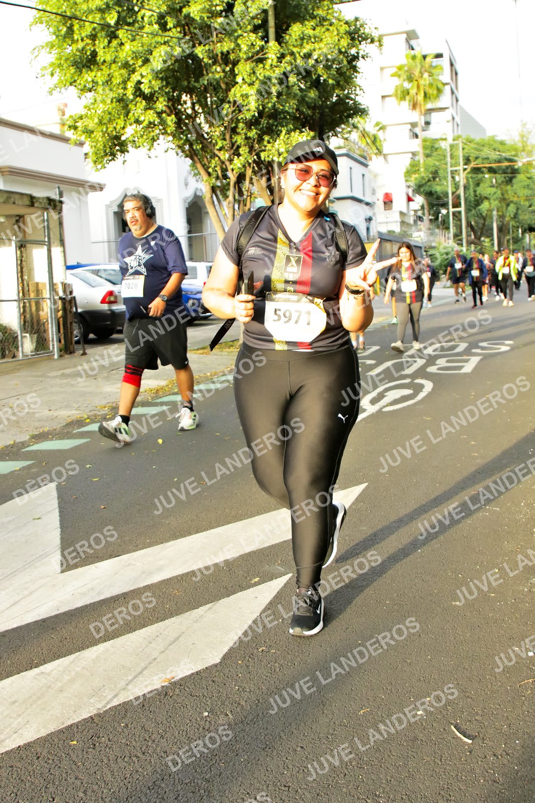 Foto de la X Carrera Leones Negros Red Cola 2026 en Rectoría General de la UdeG, Av. Juárez 976 (meta en Av. Enrique Díaz de León y Pedro Moreno), Guadalajara a las 07:34 · dorsal 5971, 7028