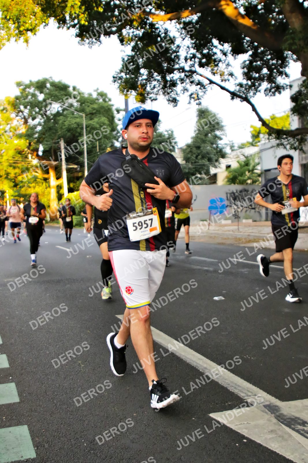 Foto de la X Carrera Leones Negros Red Cola 2026 en Rectoría General de la UdeG, Av. Juárez 976 (meta en Av. Enrique Díaz de León y Pedro Moreno), Guadalajara a las 05:03 · dorsal 5957