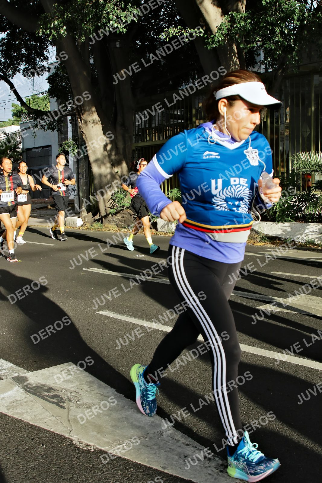 Foto de la X Carrera Leones Negros Red Cola 2026 en Rectoría General de la UdeG, Av. Juárez 976 (meta en Av. Enrique Díaz de León y Pedro Moreno), Guadalajara a las 07:56 · dorsal 12912, 11014