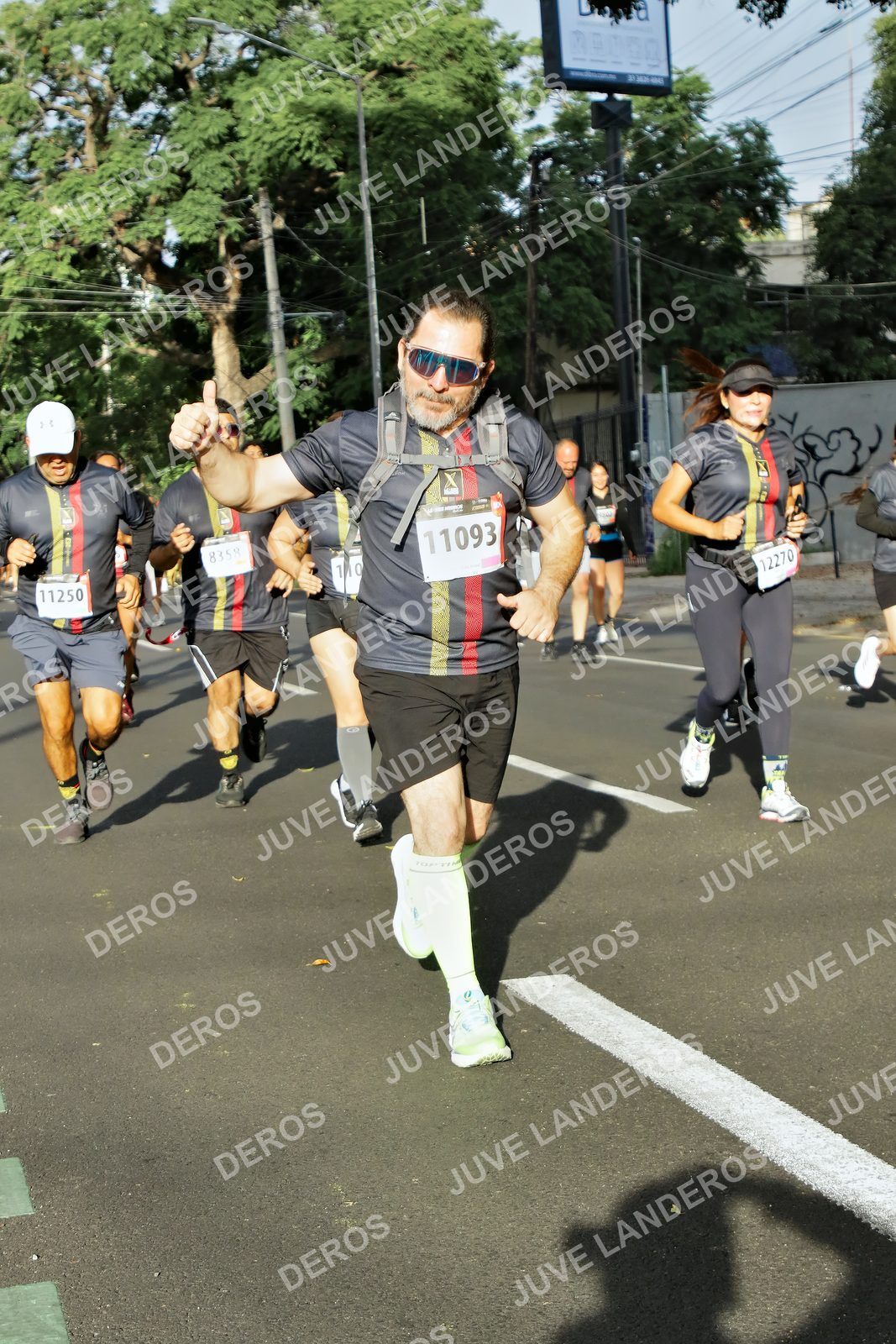 Foto de la X Carrera Leones Negros Red Cola 2026 en Rectoría General de la UdeG, Av. Juárez 976 (meta en Av. Enrique Díaz de León y Pedro Moreno), Guadalajara a las 08:00 · dorsal 11093, 11250, 12270, 8358