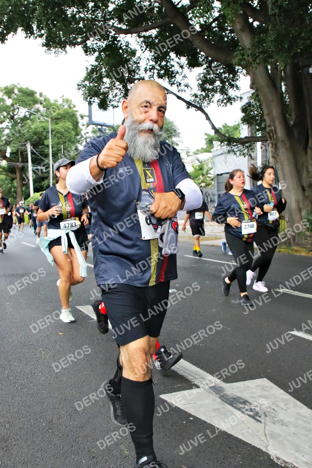 Foto de la X Carrera Leones Negros Red Cola 2026 en Rectoría General de la UdeG, Av. Juárez 976 (meta en Av. Enrique Díaz de León y Pedro Moreno), Guadalajara a las 07:14 · dorsal 4783, 2748, 4917