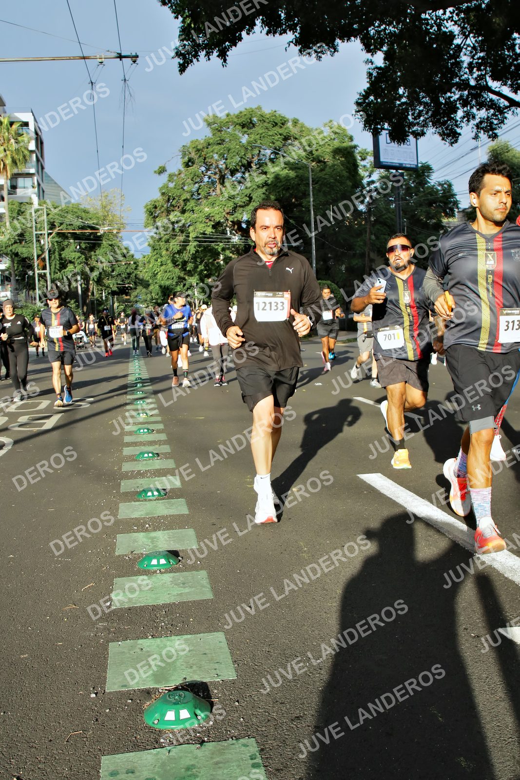 Foto de la X Carrera Leones Negros Red Cola 2026 en Rectoría General de la UdeG, Av. Juárez 976 (meta en Av. Enrique Díaz de León y Pedro Moreno), Guadalajara a las 07:52 · dorsal 313, 12133, 701