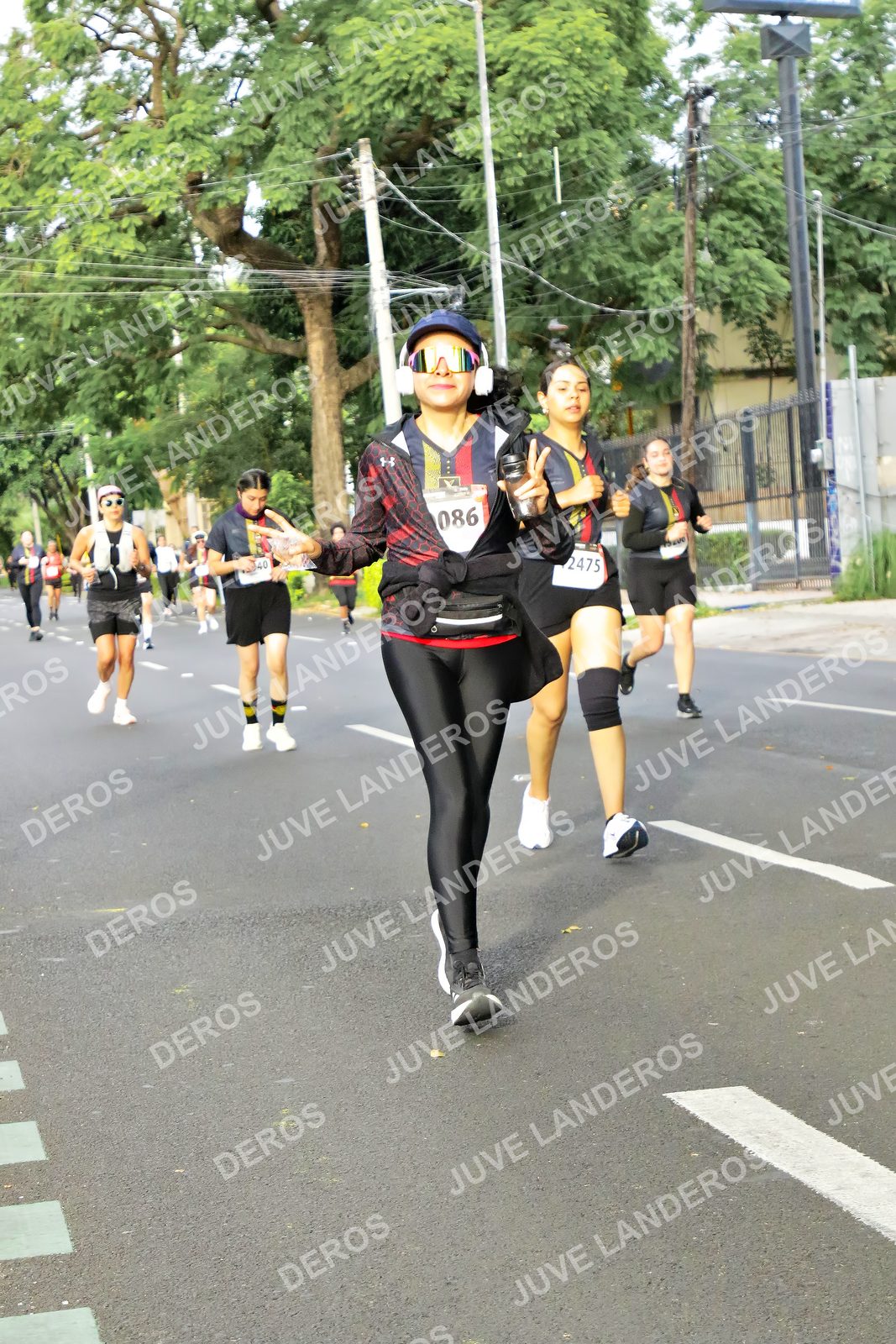 Foto de la X Carrera Leones Negros Red Cola 2026 en Rectoría General de la UdeG, Av. Juárez 976 (meta en Av. Enrique Díaz de León y Pedro Moreno), Guadalajara a las 08:13 · dorsal 86, 2475