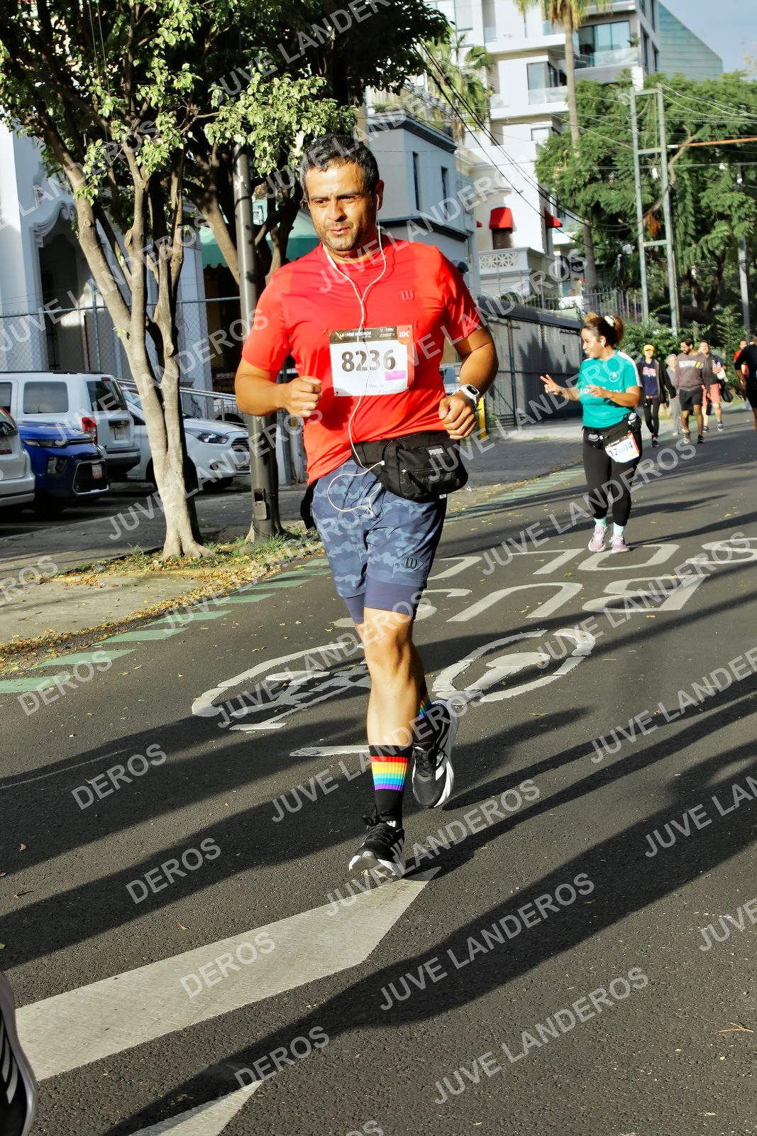 Foto de la X Carrera Leones Negros Red Cola 2026 en Rectoría General de la UdeG, Av. Juárez 976 (meta en Av. Enrique Díaz de León y Pedro Moreno), Guadalajara a las 07:58 · dorsal 8236, 12004
