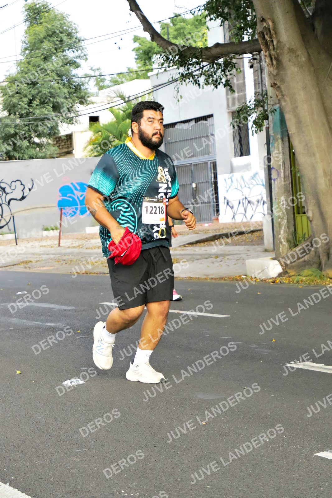 Foto de la X Carrera Leones Negros Red Cola 2026 en Rectoría General de la UdeG, Av. Juárez 976 (meta en Av. Enrique Díaz de León y Pedro Moreno), Guadalajara a las 08:17 · dorsal 12218