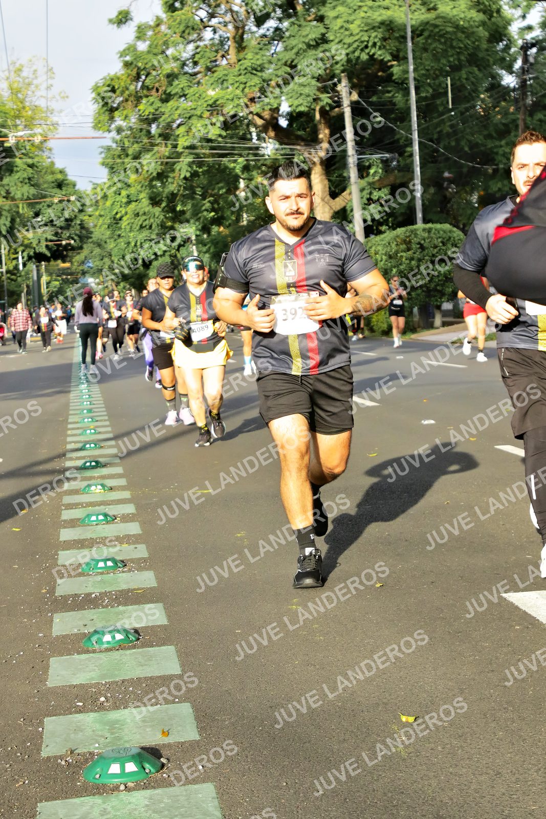 Foto de la X Carrera Leones Negros Red Cola 2026 en Rectoría General de la UdeG, Av. Juárez 976 (meta en Av. Enrique Díaz de León y Pedro Moreno), Guadalajara a las 08:01 · dorsal 392