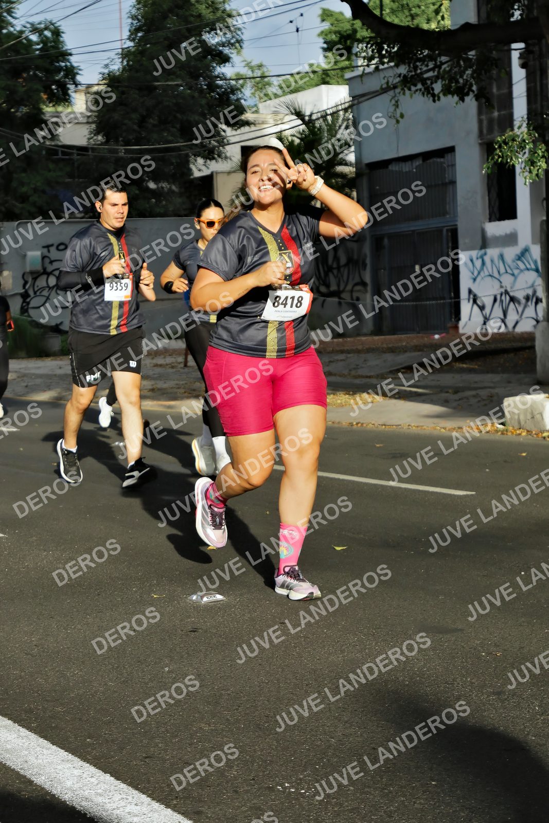 Foto de la X Carrera Leones Negros Red Cola 2026 en Rectoría General de la UdeG, Av. Juárez 976 (meta en Av. Enrique Díaz de León y Pedro Moreno), Guadalajara a las 07:58 · dorsal 8418, 9359